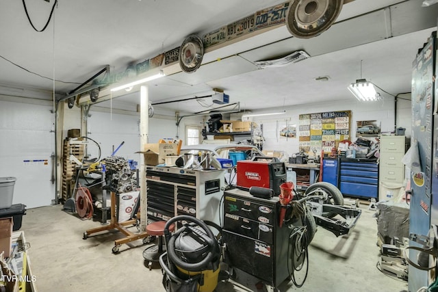 garage with a workshop area