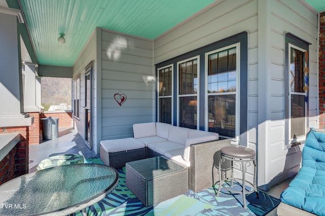 view of patio / terrace featuring an outdoor hangout area and covered porch