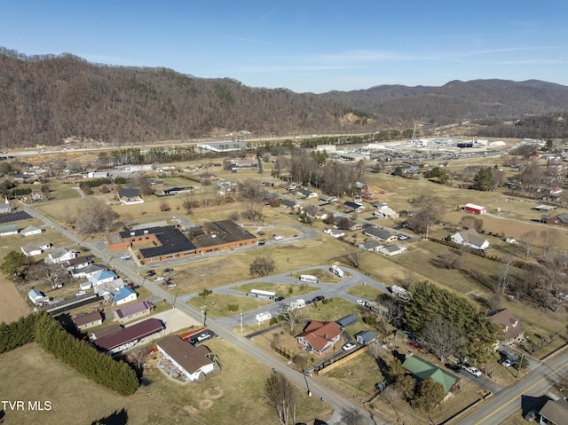 drone / aerial view featuring a mountain view