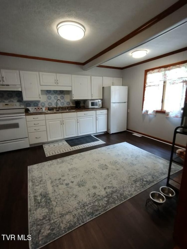 kitchen featuring white cabinetry, sink, dark hardwood / wood-style flooring, crown molding, and white appliances