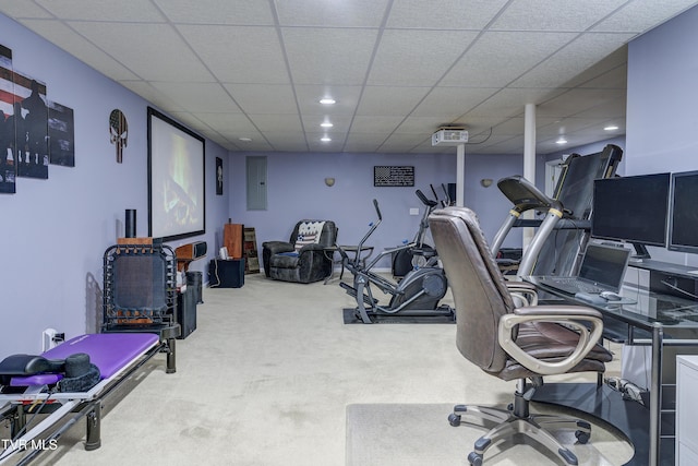 office area with a drop ceiling and carpet