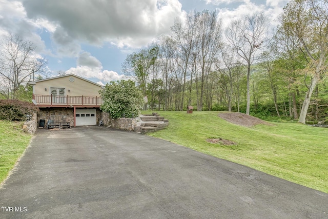 112 Conns Dr, Tazewell, VA 24651 - exterior space with a garage, a front yard, a deck, and aphalt driveway
