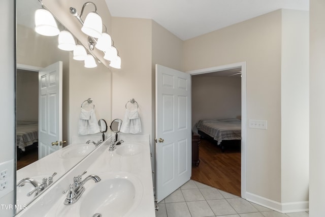 bathroom with vanity and tile patterned floors