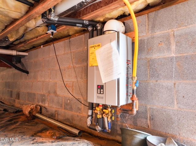 utility room featuring water heater