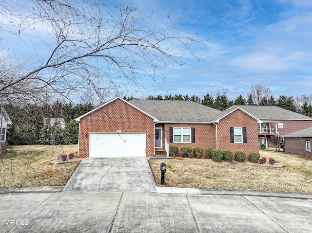 ranch-style home with a garage and a front yard