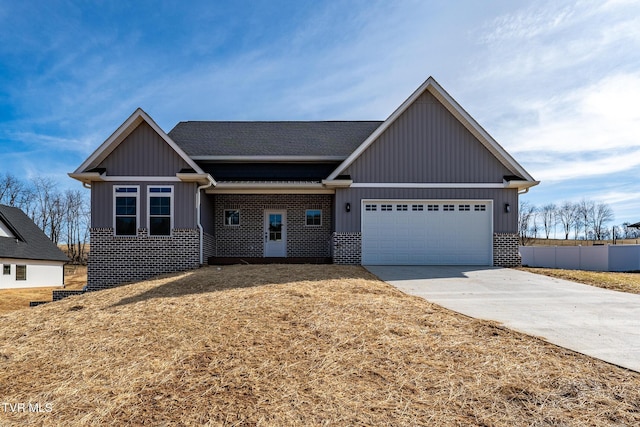 view of front of property with a garage and a front yard