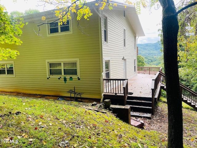 rear view of house with a deck