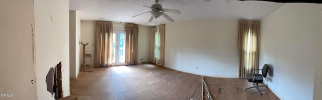 unfurnished room with ceiling fan