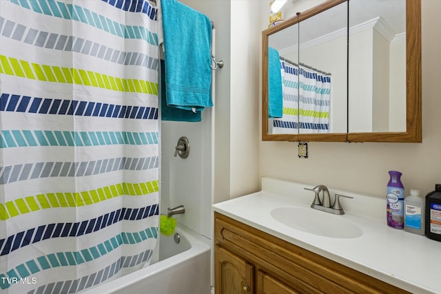 bathroom featuring shower / bathtub combination with curtain, vanity, and crown molding