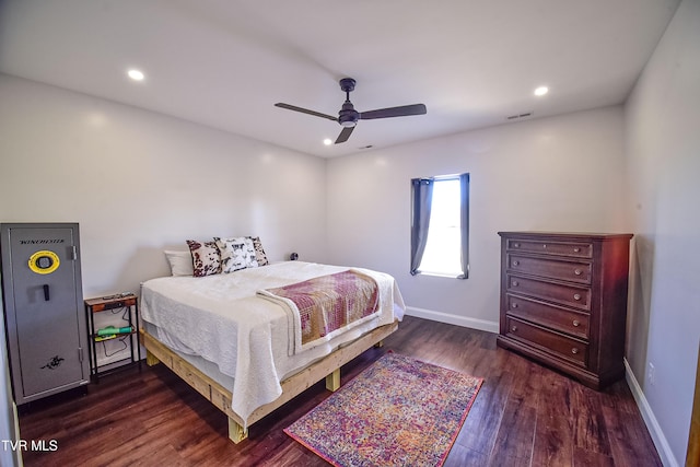 bedroom featuring dark wood-type flooring and ceiling fan