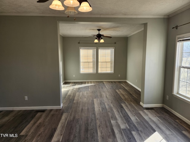 unfurnished room featuring plenty of natural light and a textured ceiling