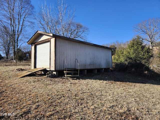 view of outdoor structure with a garage