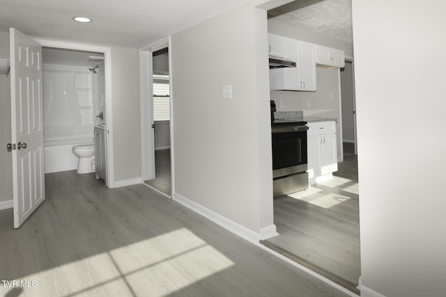 hall featuring light wood-type flooring