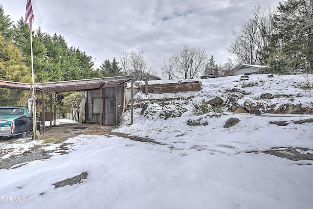 view of yard covered in snow