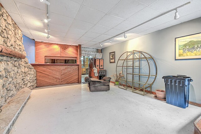 169 Church Cir, Bristol, TN 37620 - living area with track lighting, concrete floors, and wooden walls