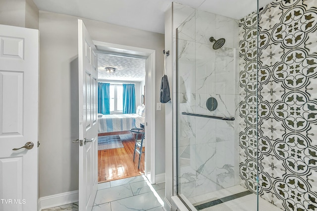 bathroom with a shower with shower door