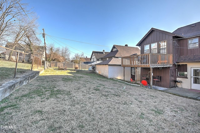 view of yard featuring a wooden deck