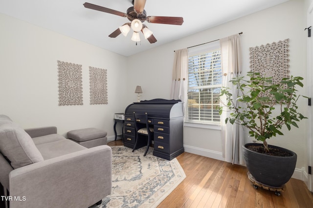 interior space featuring light hardwood / wood-style flooring and ceiling fan