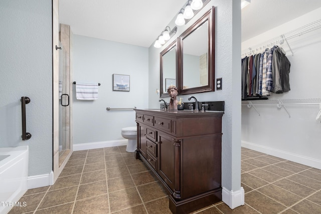 full bathroom featuring plus walk in shower, vanity, tile patterned floors, and toilet