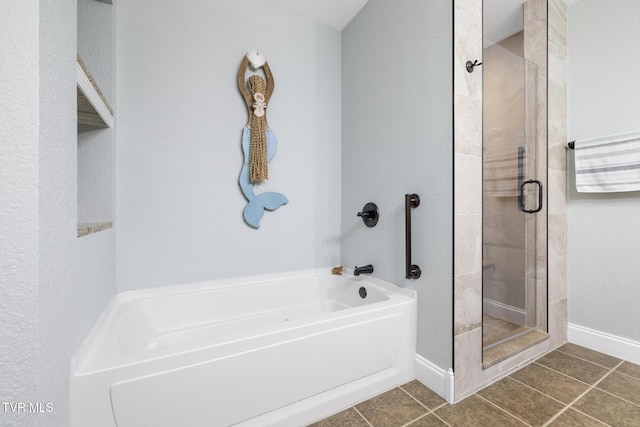 bathroom with tile patterned flooring and plus walk in shower