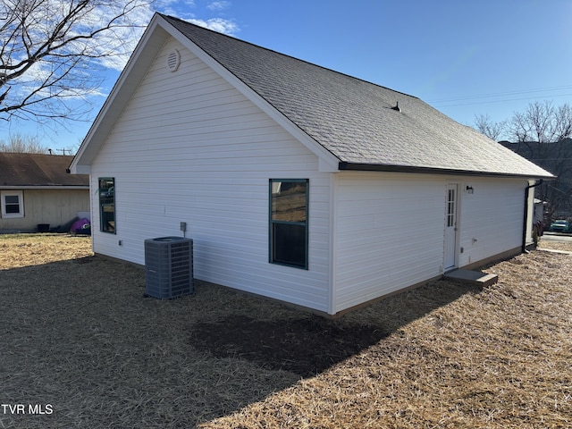 view of side of home with cooling unit