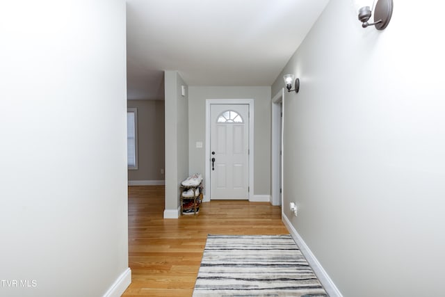 foyer with light hardwood / wood-style floors