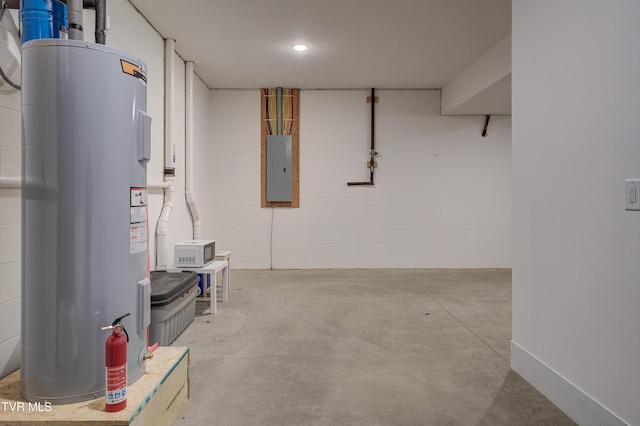 basement with electric water heater and electric panel