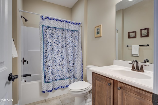 full bathroom featuring shower / tub combo, vanity, toilet, and tile patterned flooring