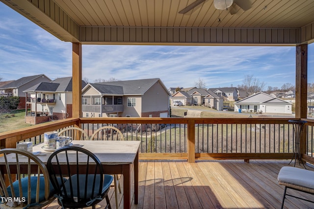 wooden terrace featuring ceiling fan