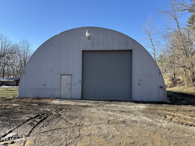 view of outdoor structure with a garage