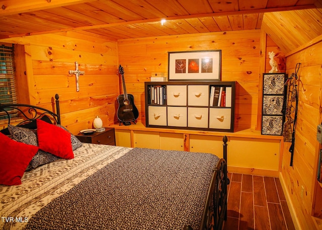 bedroom featuring wood walls and wooden ceiling