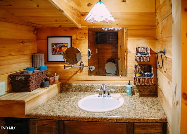 bathroom featuring vanity and wood ceiling