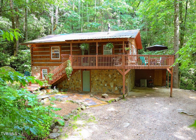 cabin featuring a deck