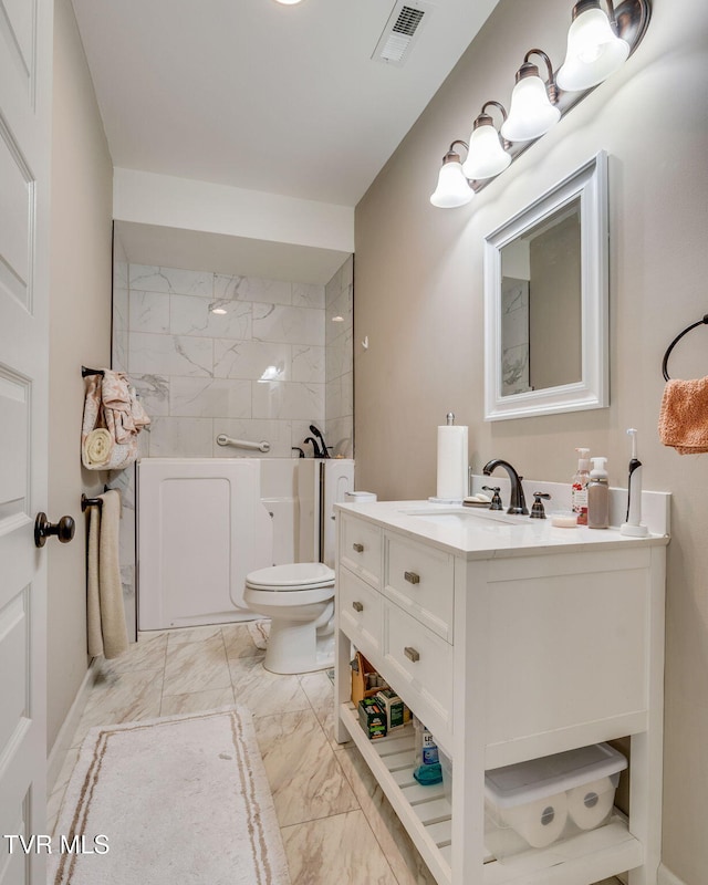 full bath with visible vents, a shower, toilet, marble finish floor, and vanity