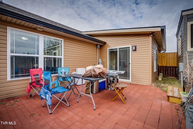 view of patio / terrace with fence