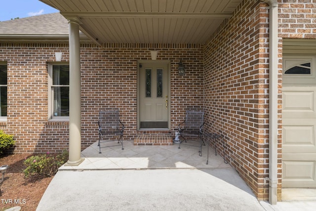 property entrance with a garage