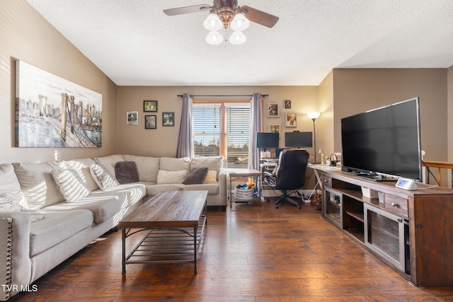 living room featuring a textured ceiling, dark hardwood / wood-style floors, and ceiling fan