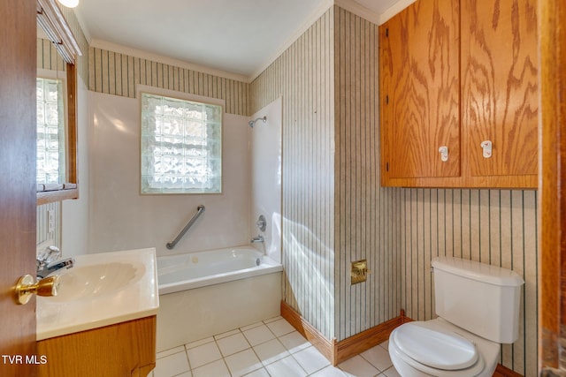 bathroom featuring tile patterned flooring, vanity, plenty of natural light, and a tub to relax in