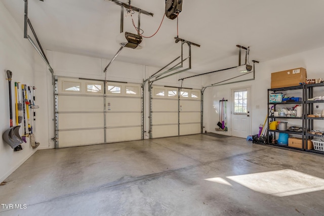 garage featuring a garage door opener