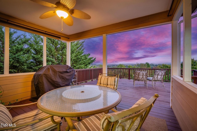 sunroom / solarium with ceiling fan