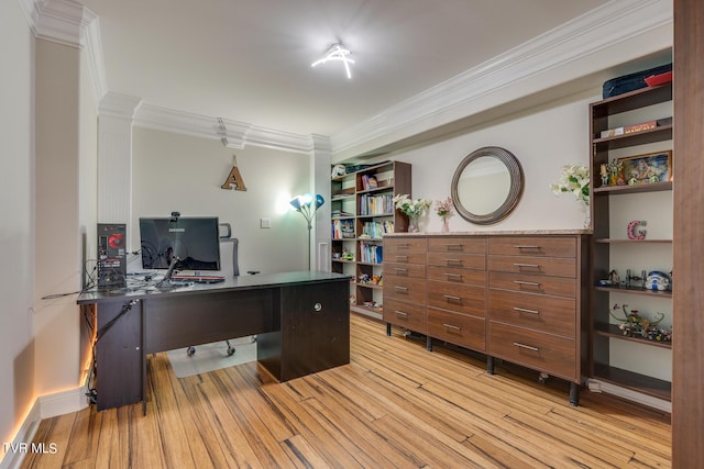 office space with light hardwood / wood-style flooring and ornamental molding