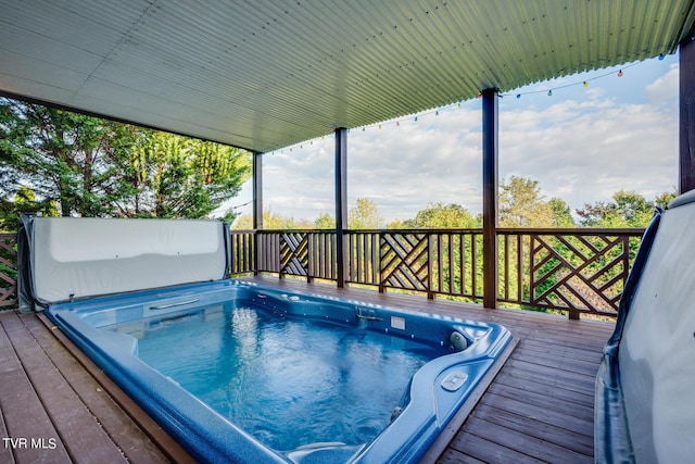 view of pool with a deck