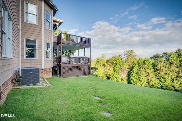 view of yard featuring a wooden deck and cooling unit