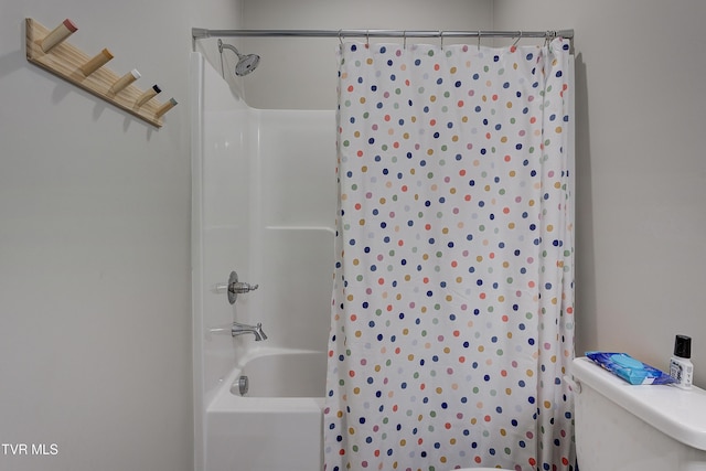 bathroom featuring  shower combination and toilet