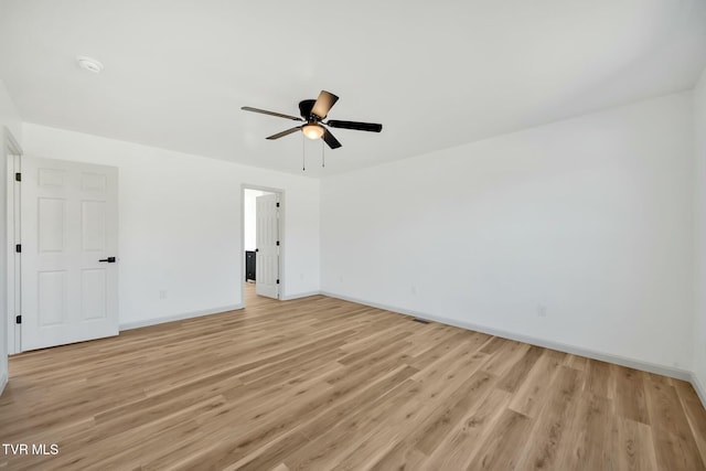 unfurnished bedroom with ceiling fan and light wood-type flooring