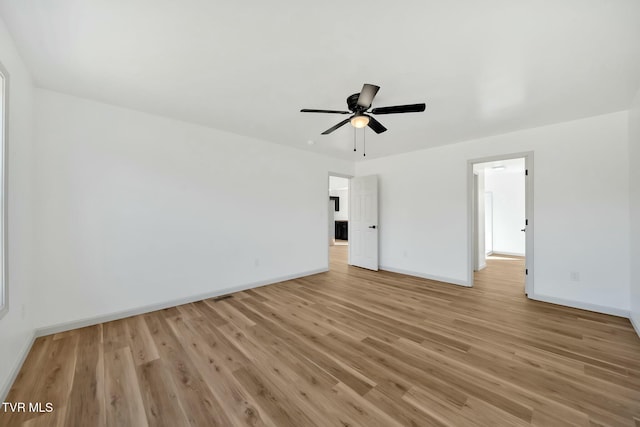 interior space with ceiling fan and light hardwood / wood-style floors