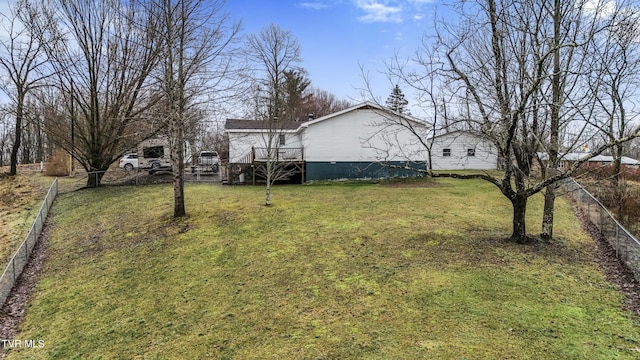 view of yard with a deck