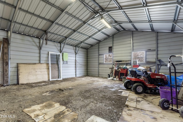 garage featuring a carport