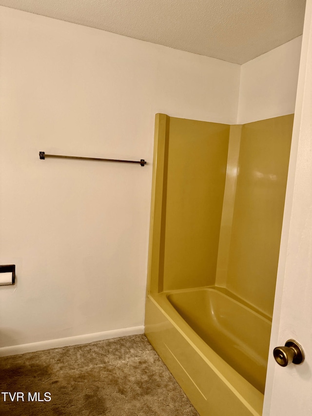 bathroom with a textured ceiling