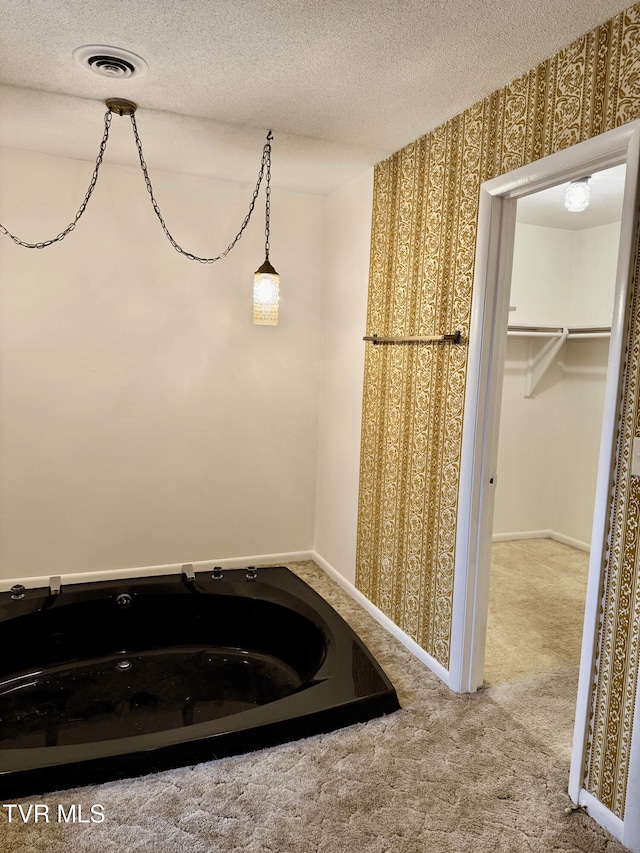 bathroom with a textured ceiling